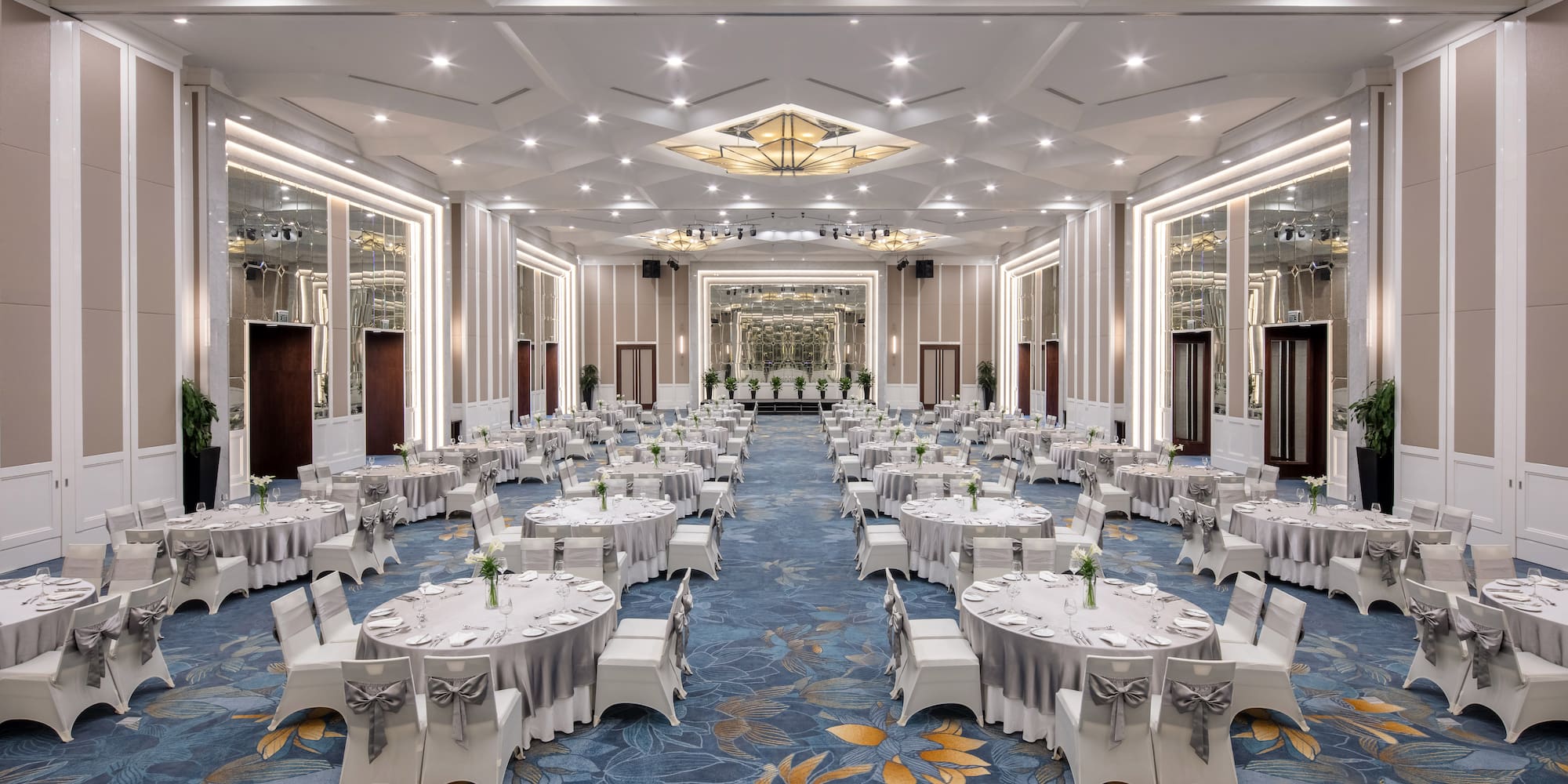 a large room with tables and chairs