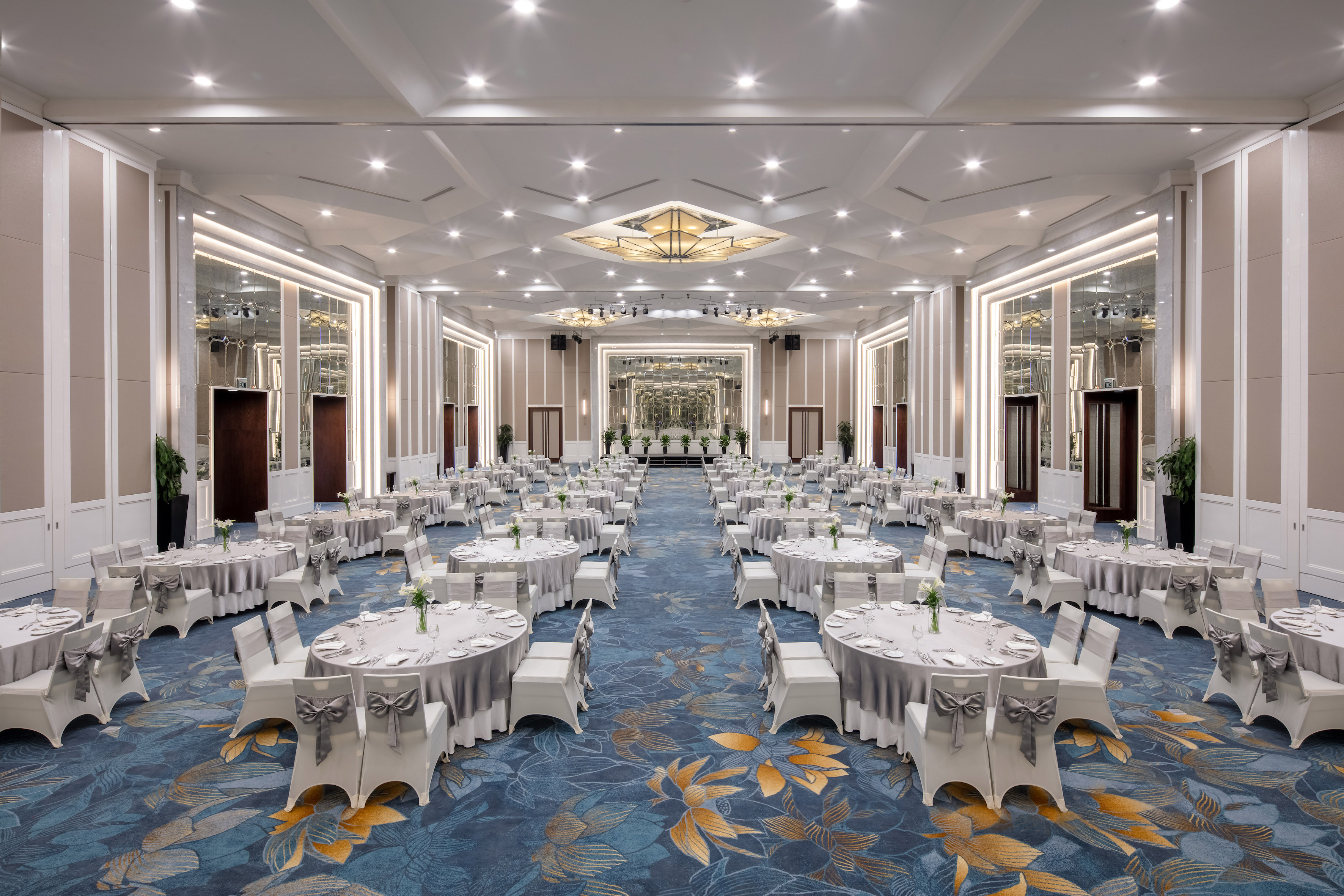 a large room with tables and chairs