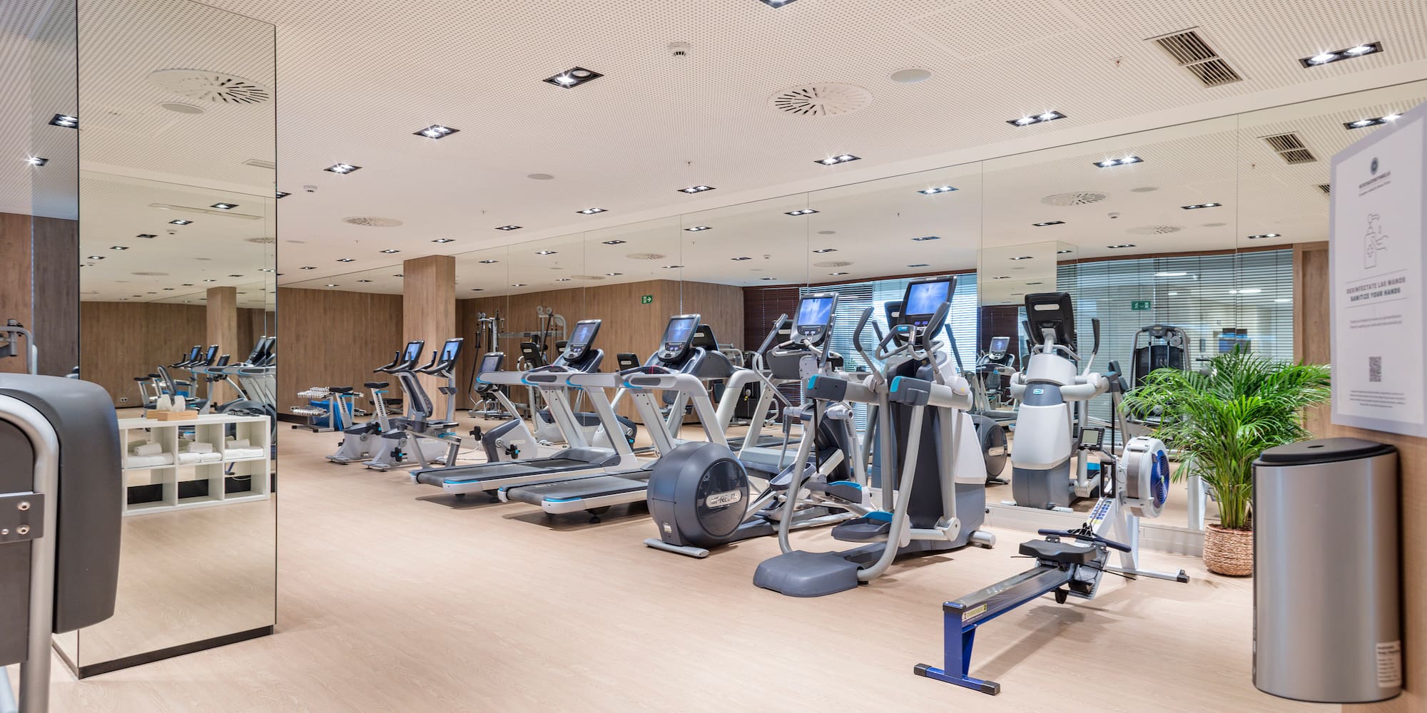 a large room with exercise equipment