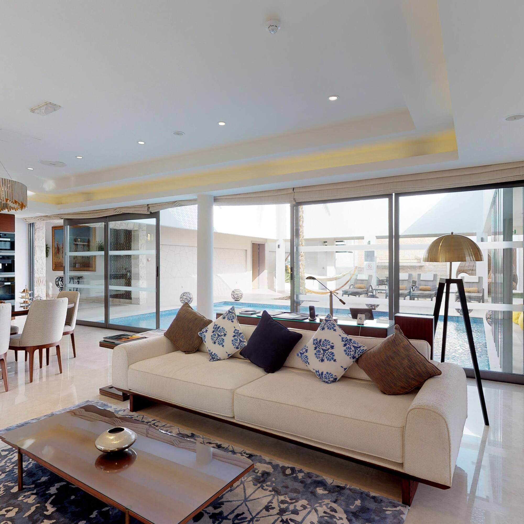 a living room with a couch and a table