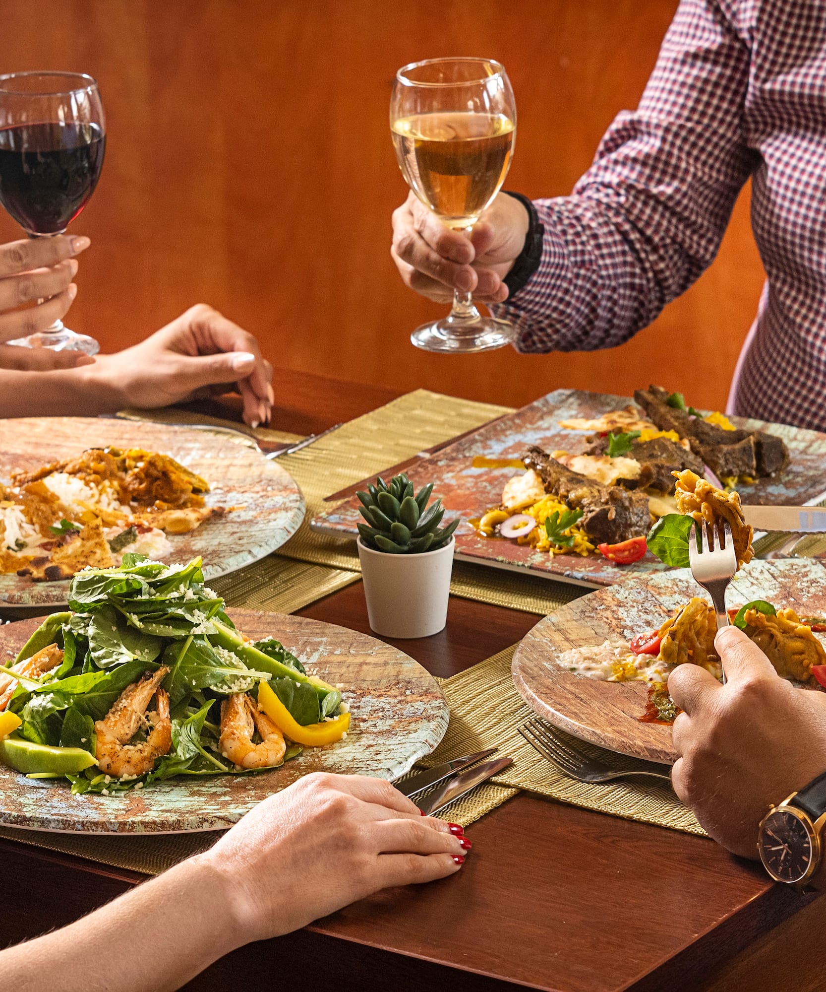 a group of people eating at a table