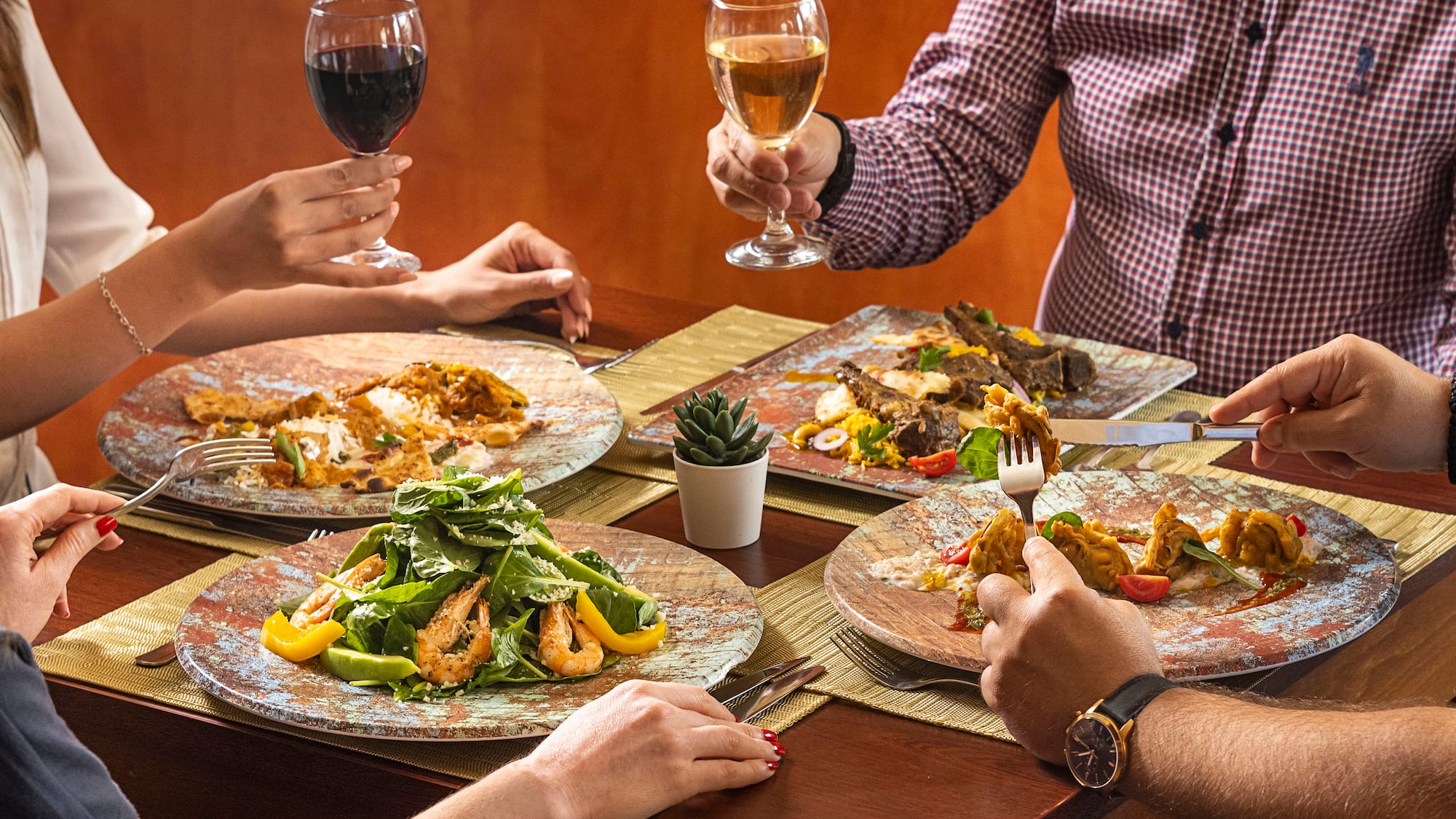a group of people eating at a table