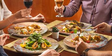 a group of people eating at a table