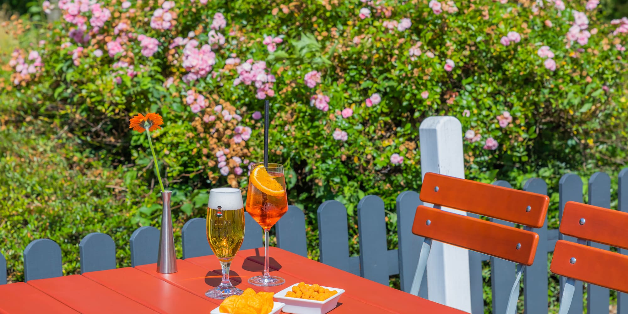 a table with drinks and snacks on it