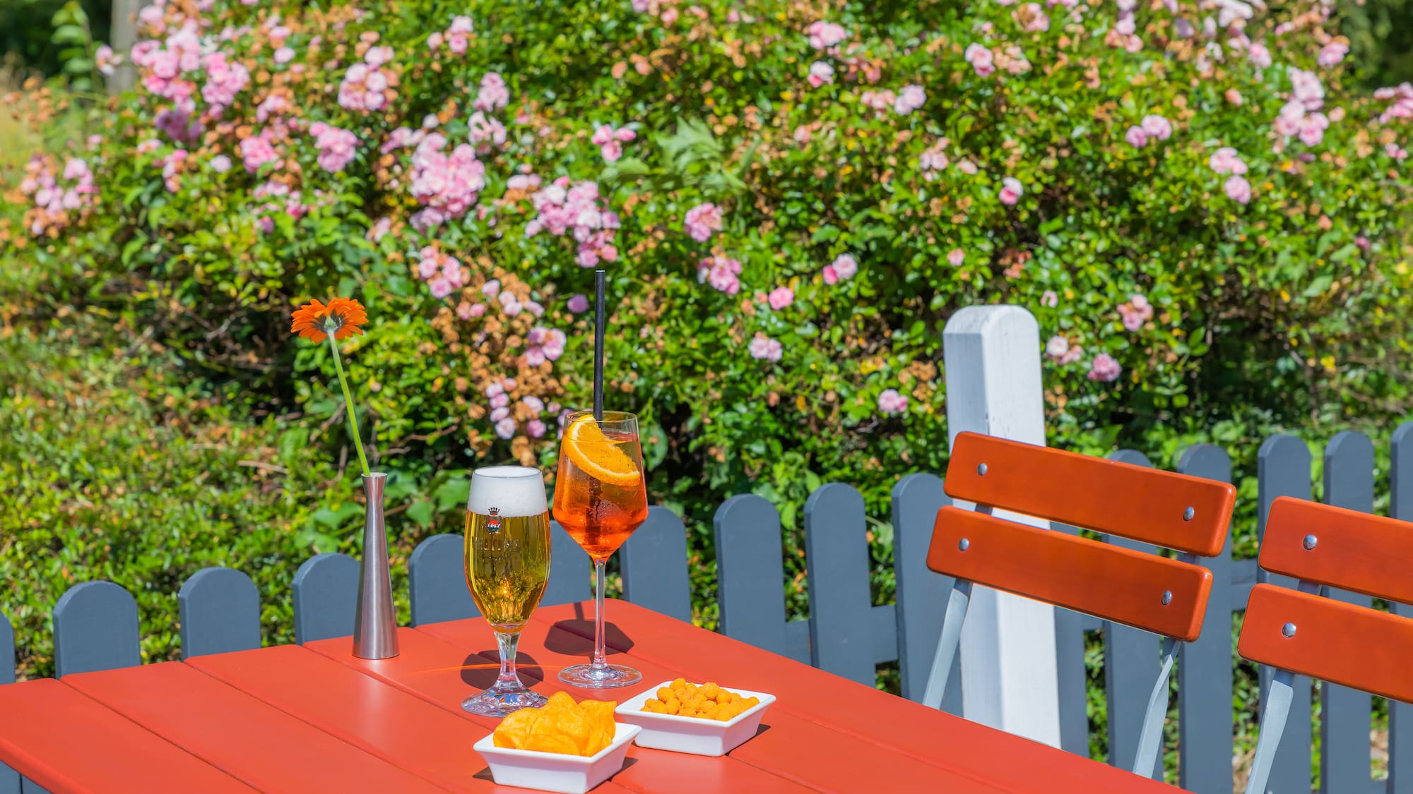 a table with drinks and snacks on it