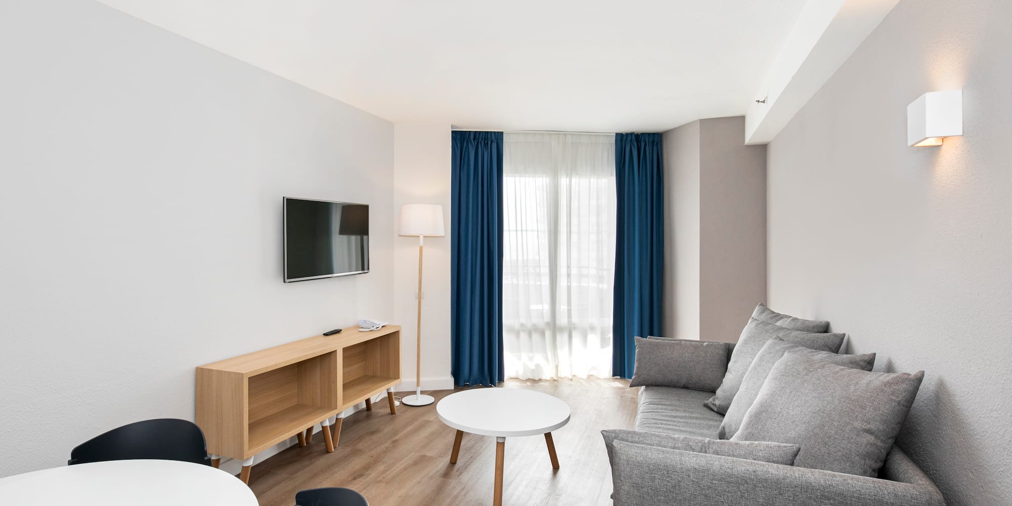 a room with a couch and a tv