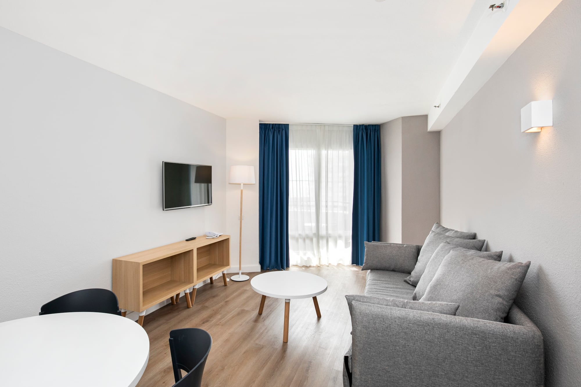 a room with a couch and a tv