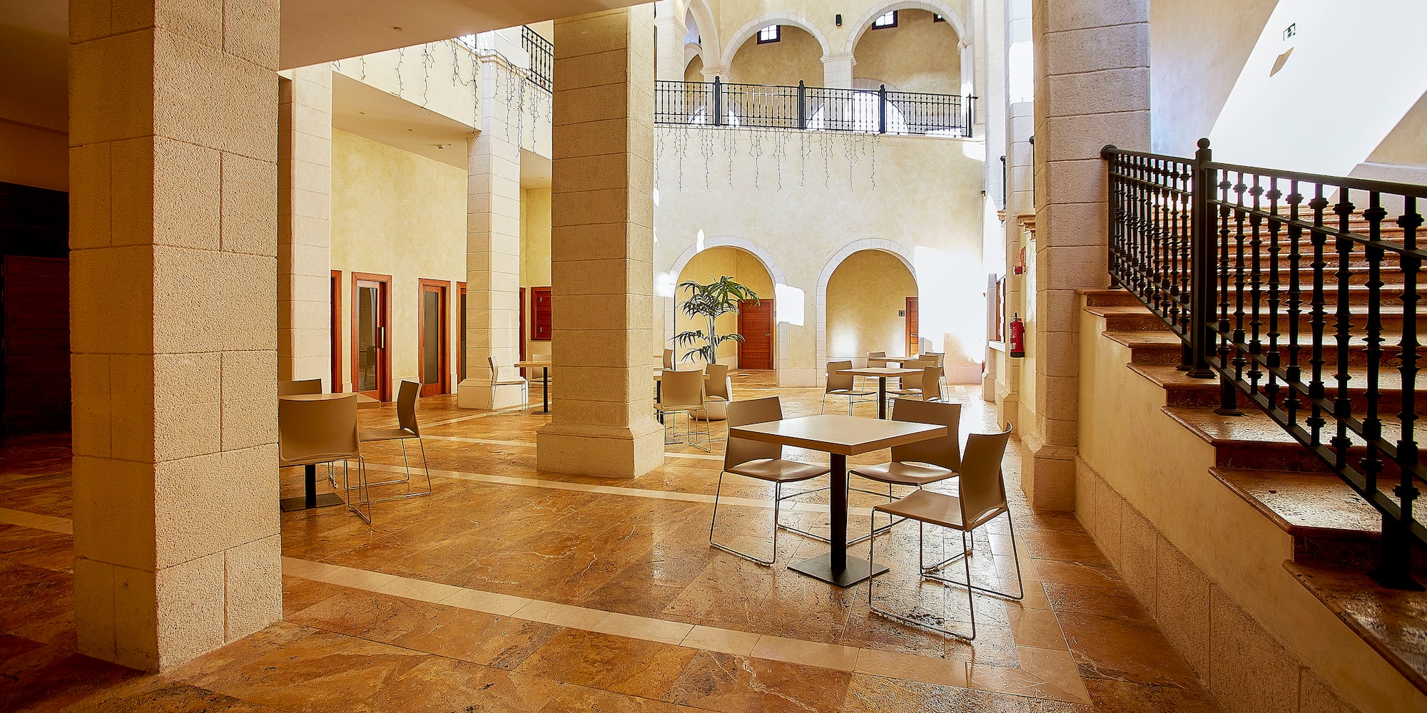 a room with a table and chairs