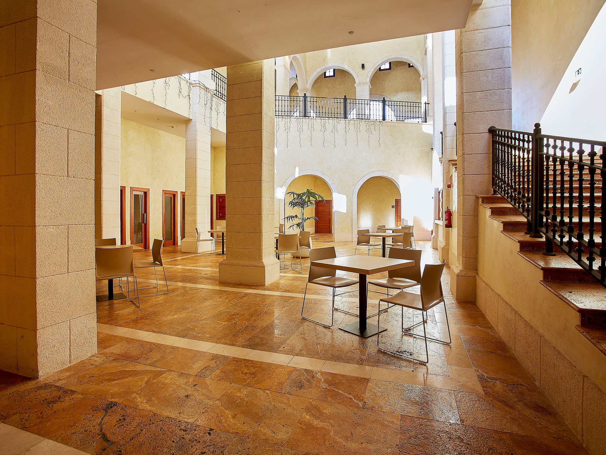 a room with a table and chairs