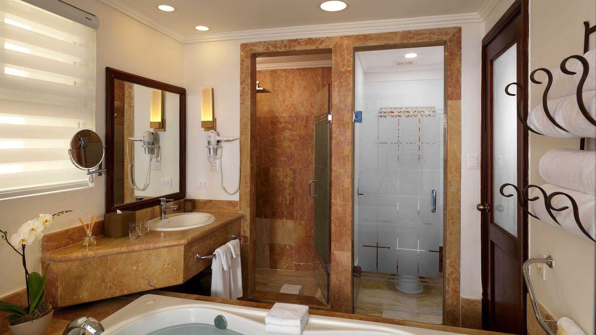 a bathroom with a bathtub and sink