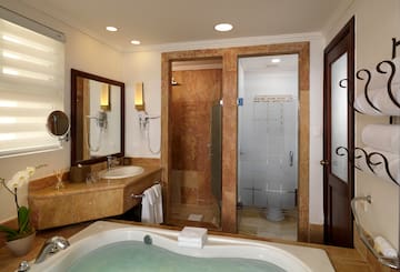 a bathroom with a bathtub and sink