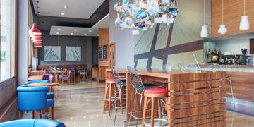 a room with tables and chairs