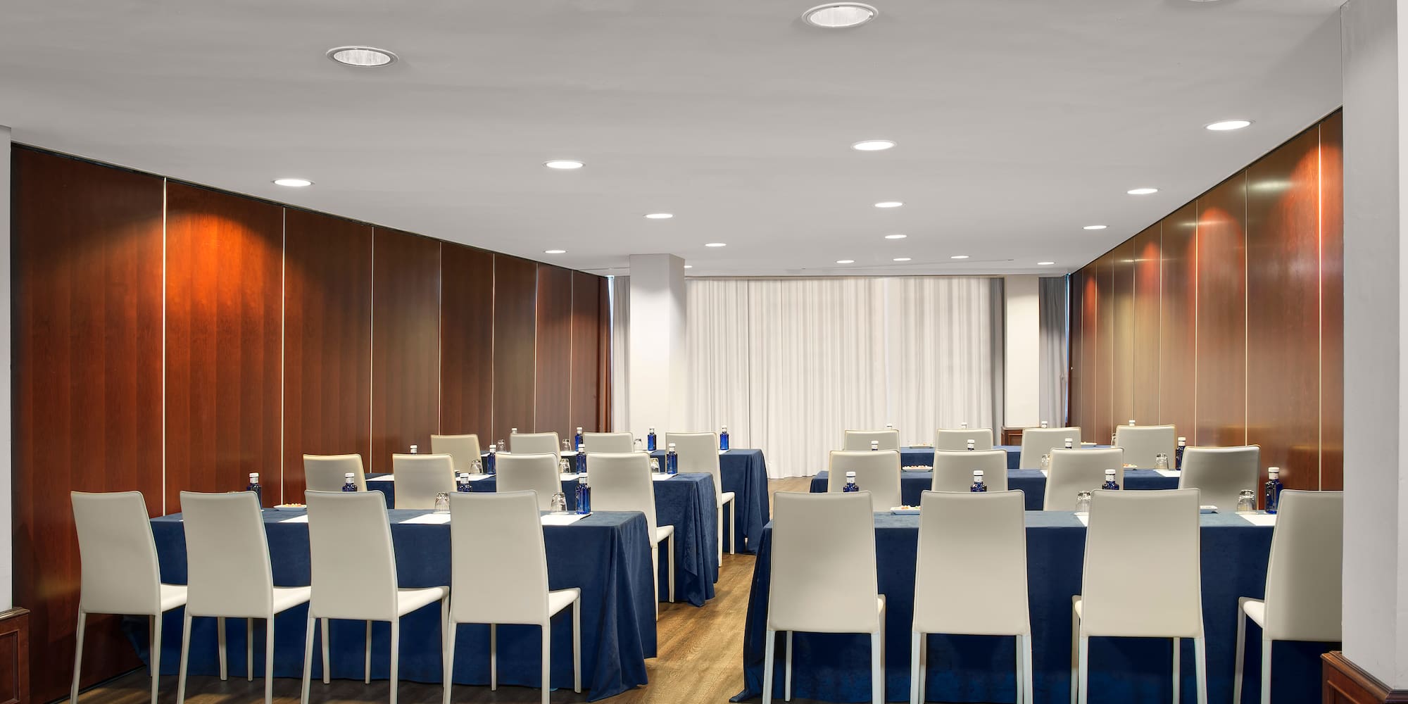 a room with tables and chairs