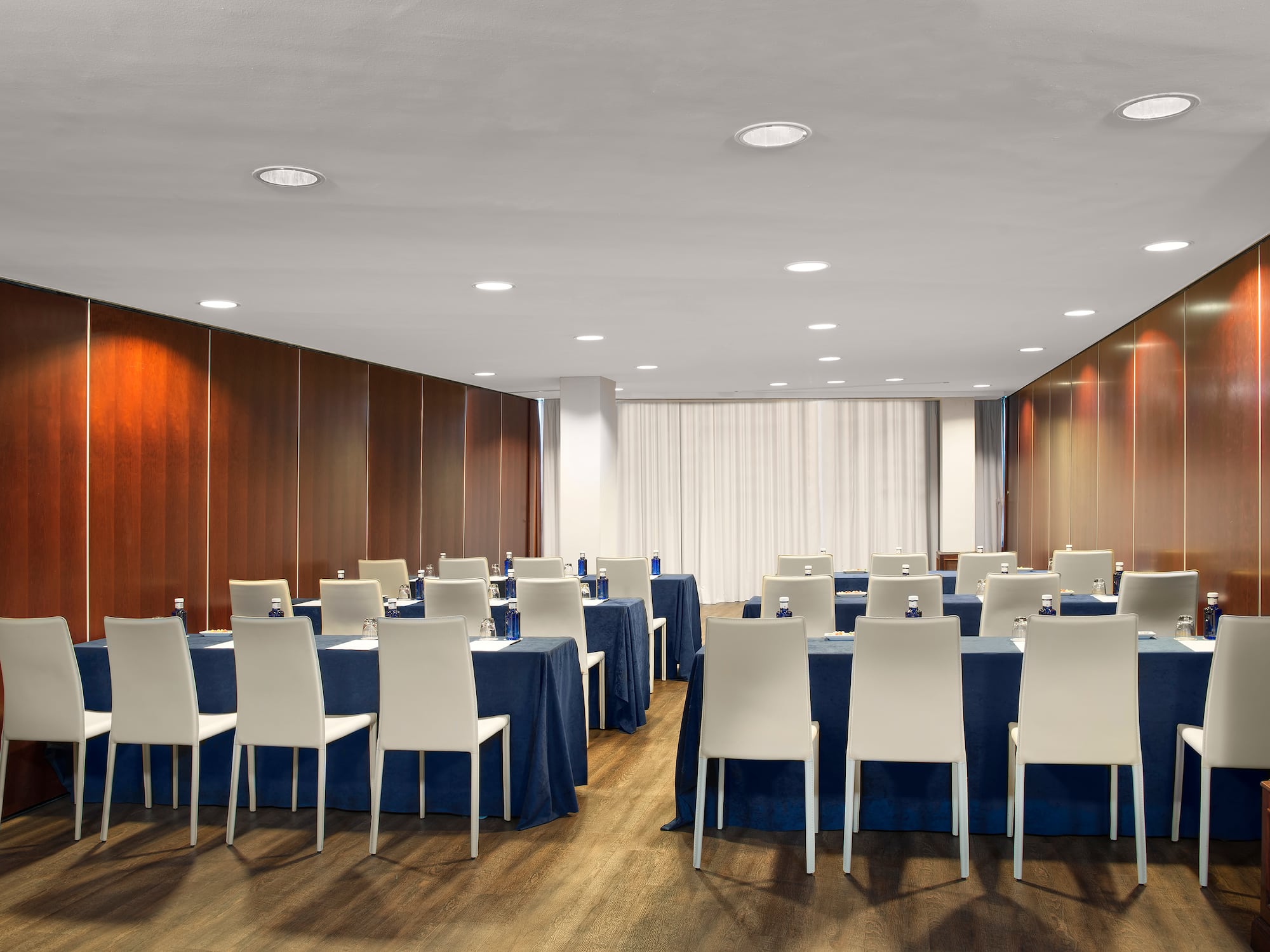 a room with tables and chairs