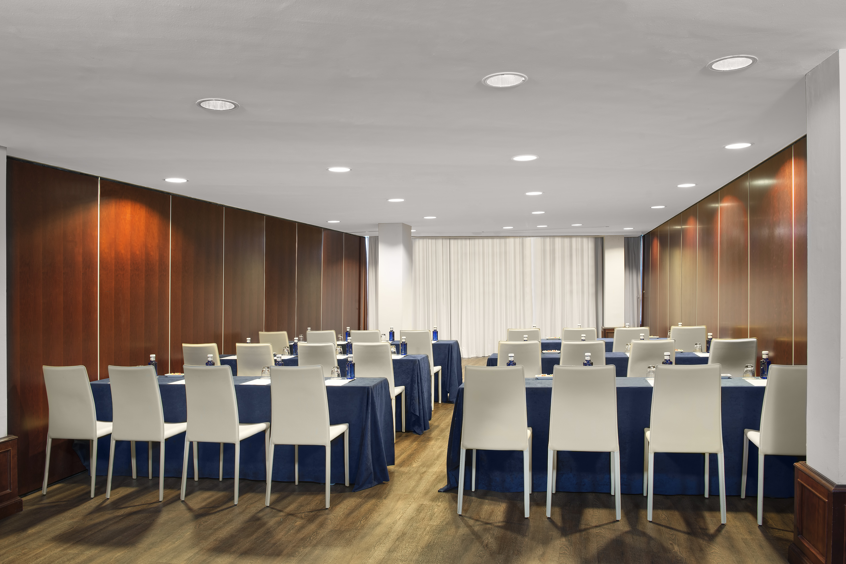 a room with tables and chairs