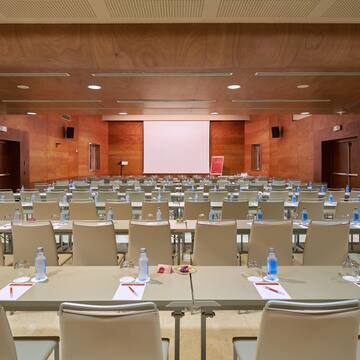 a room with tables and chairs