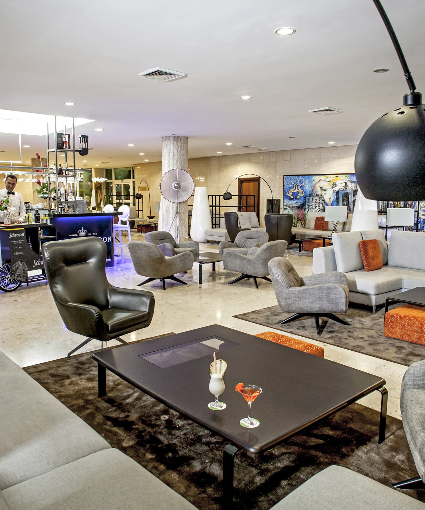 a room with a large table and chairs