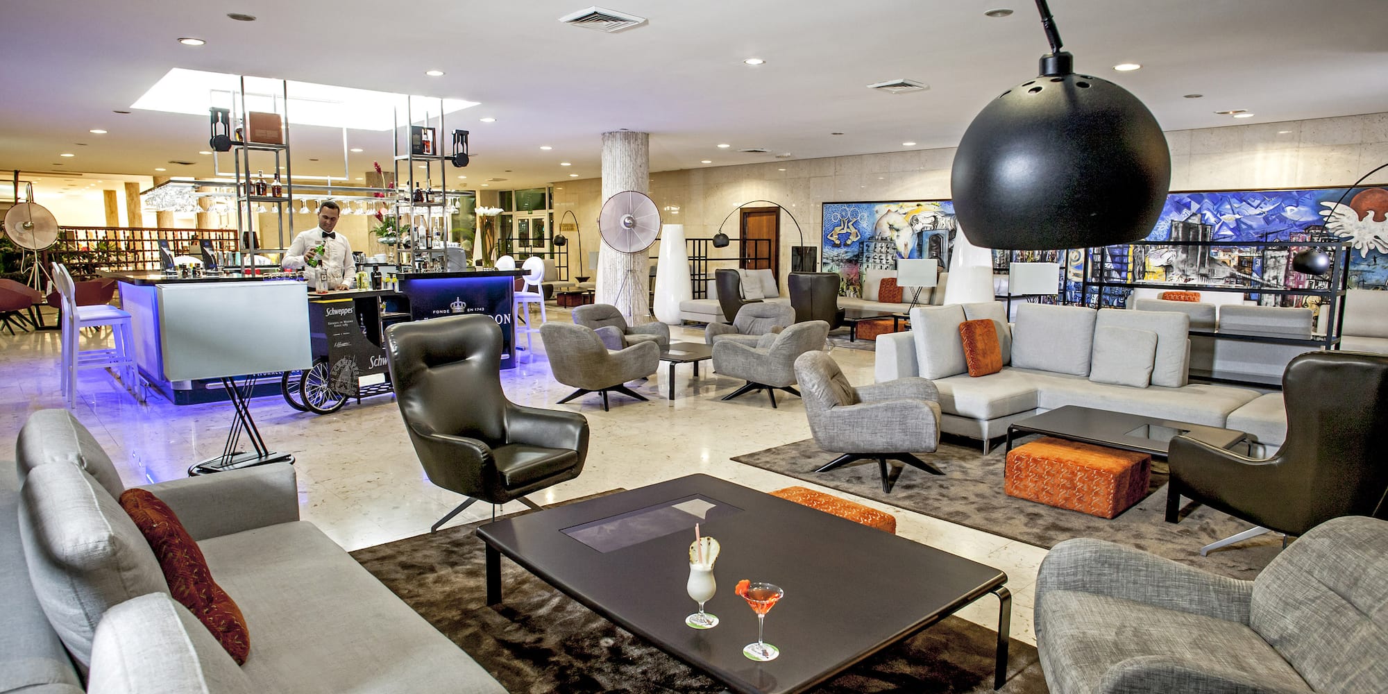 a room with a large table and chairs