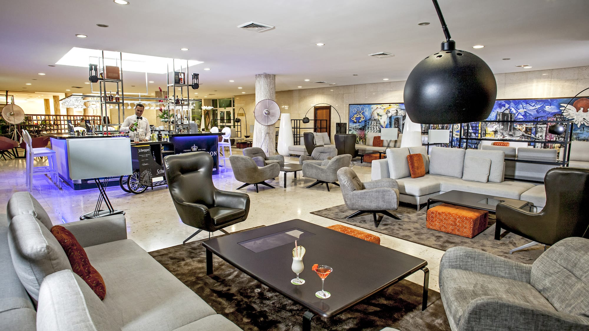 a room with a large table and chairs