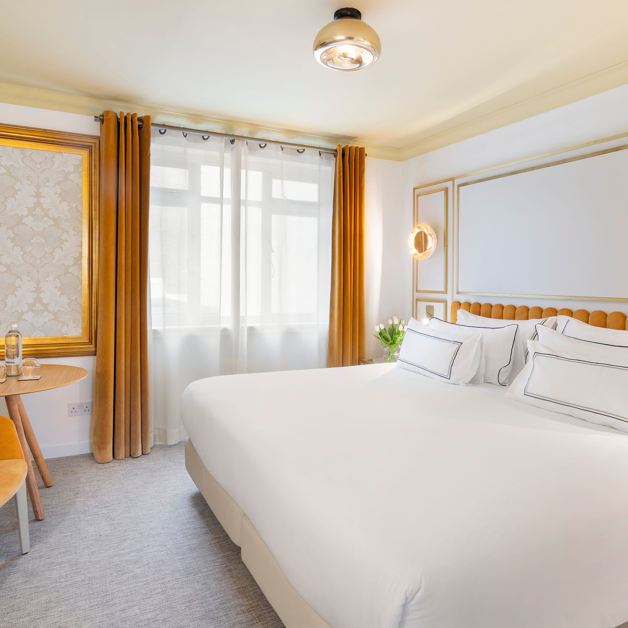 a room with a bed and a table