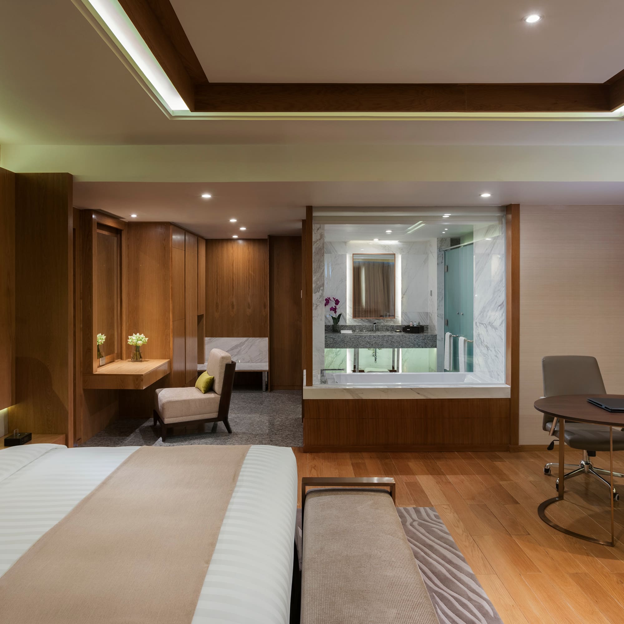 a room with a bed and a desk