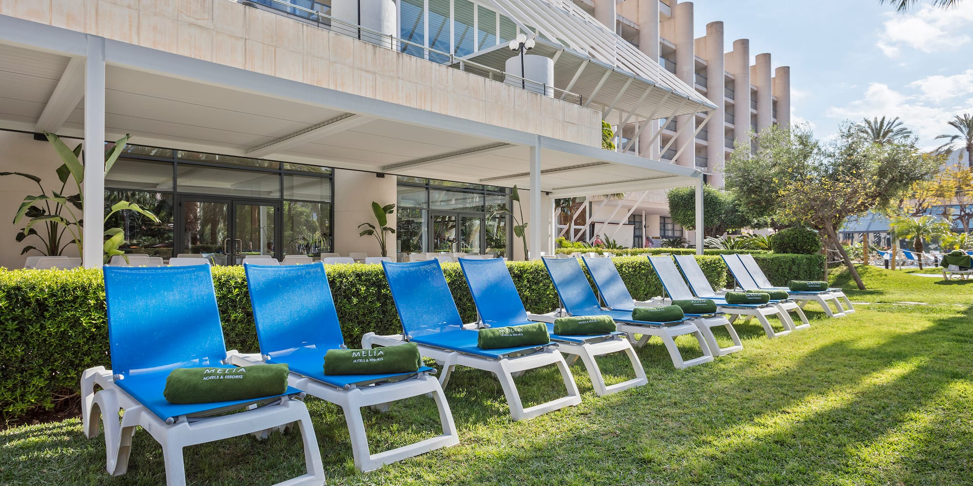a row of lounge chairs in a row
