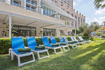 a row of lounge chairs in a row