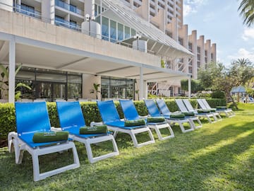 a row of lounge chairs in a row