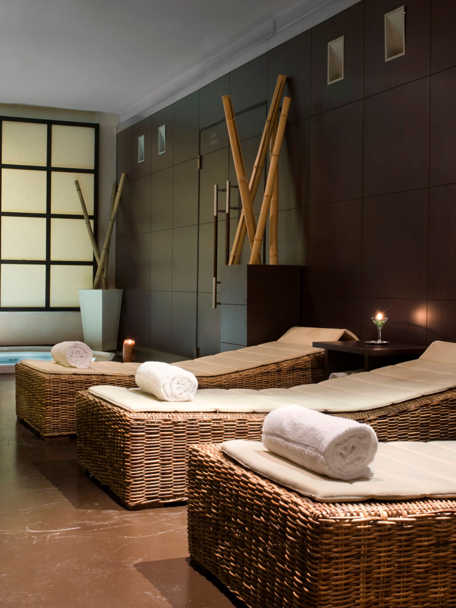 a room with chairs and a bathtub