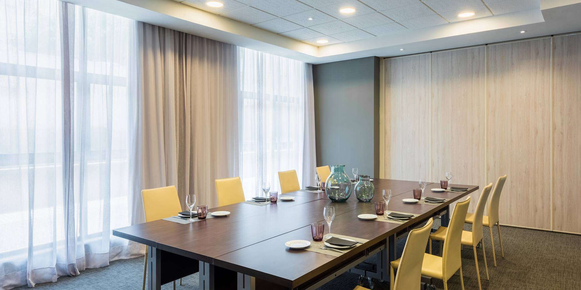 a room with a table and chairs