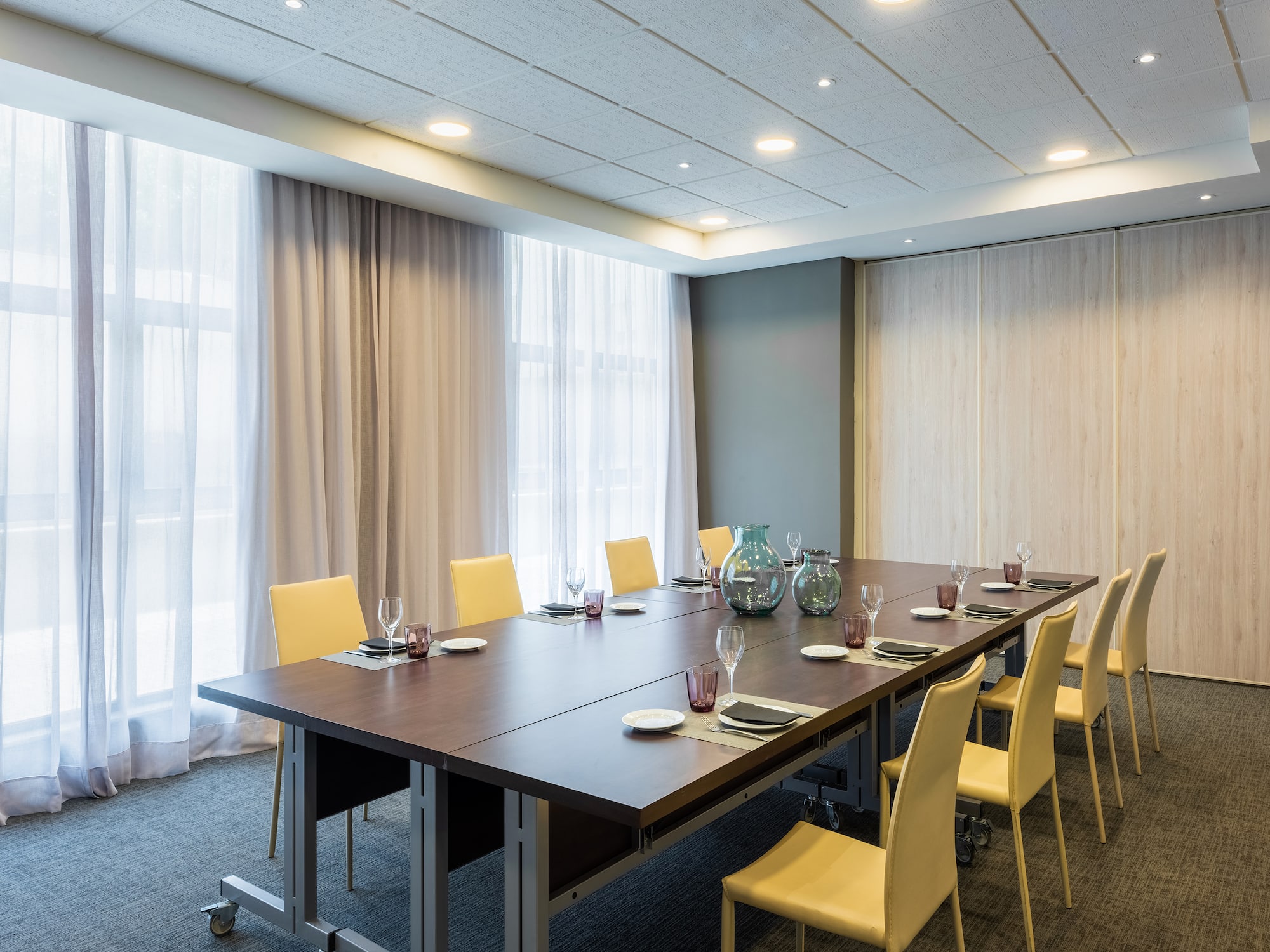 a room with a table and chairs