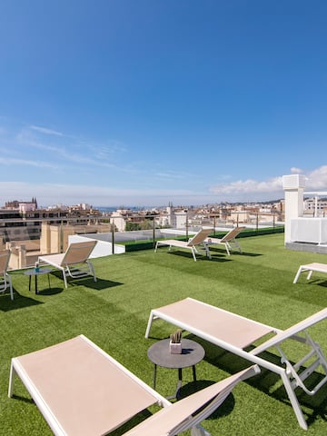 a deck chairs on a rooftop
