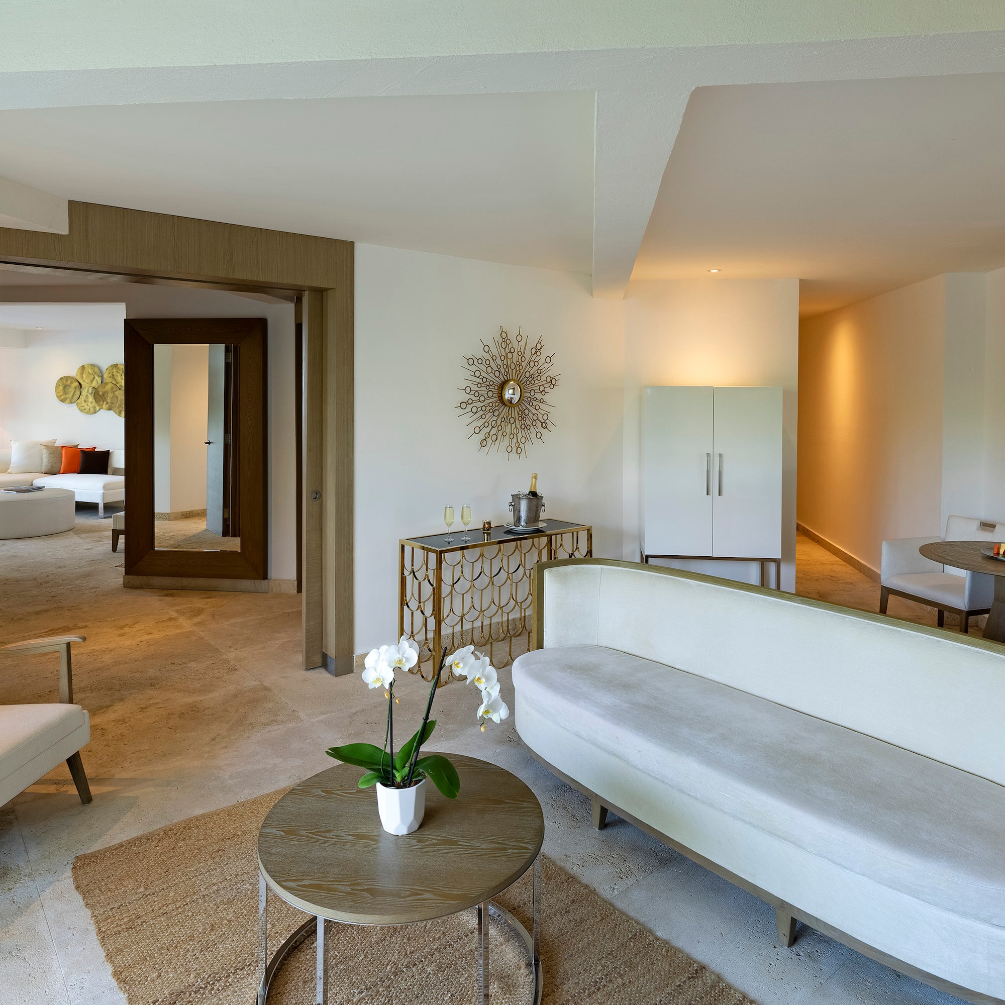 a living room with a couch and a table