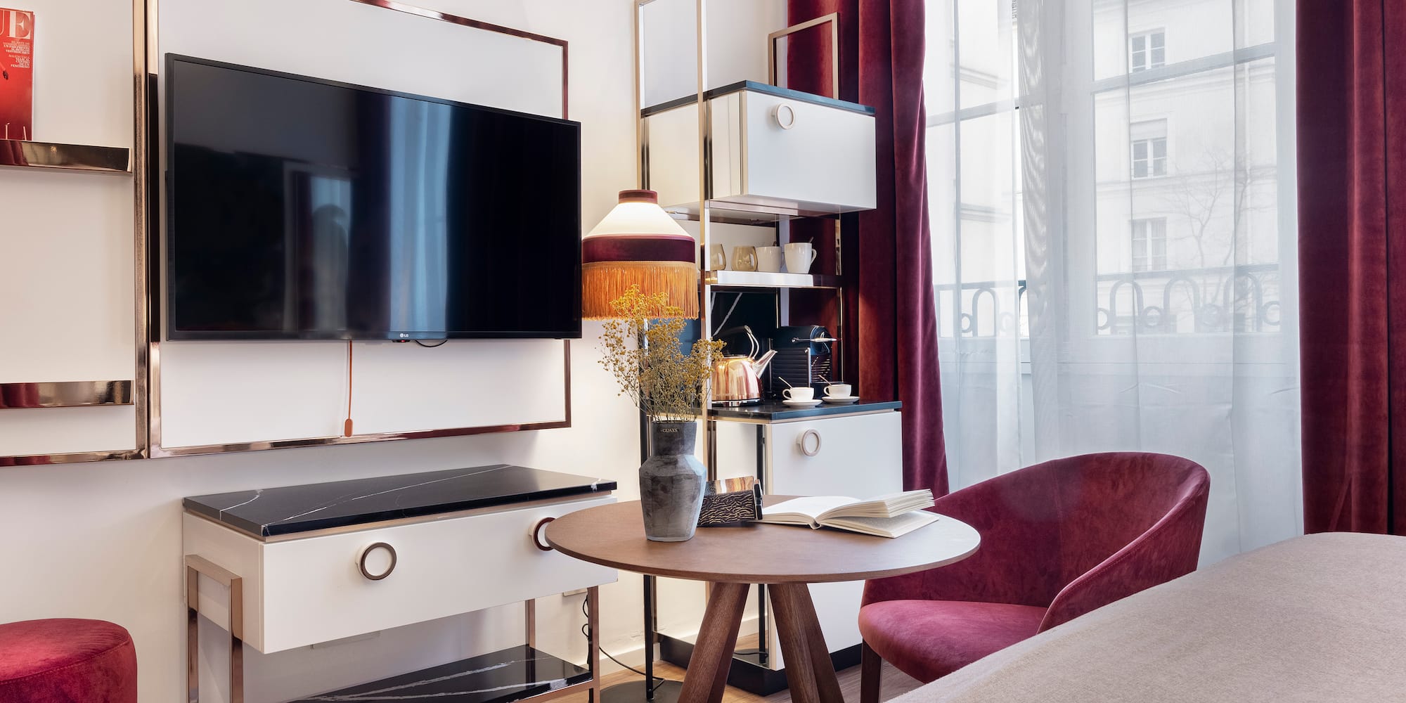 a room with a tv and a table