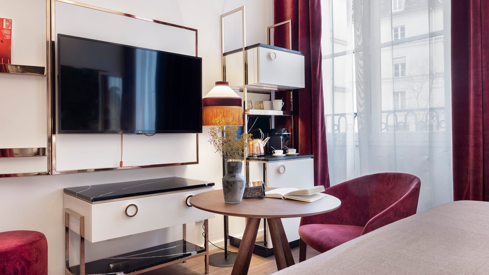 a room with a tv and a table