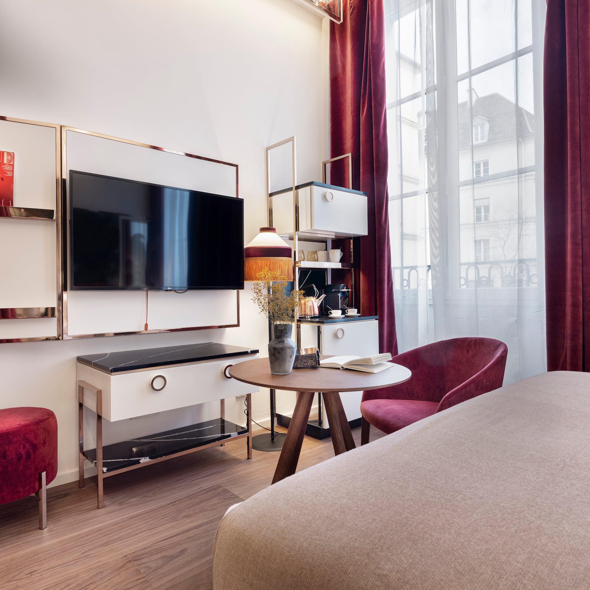 a room with a tv and a table