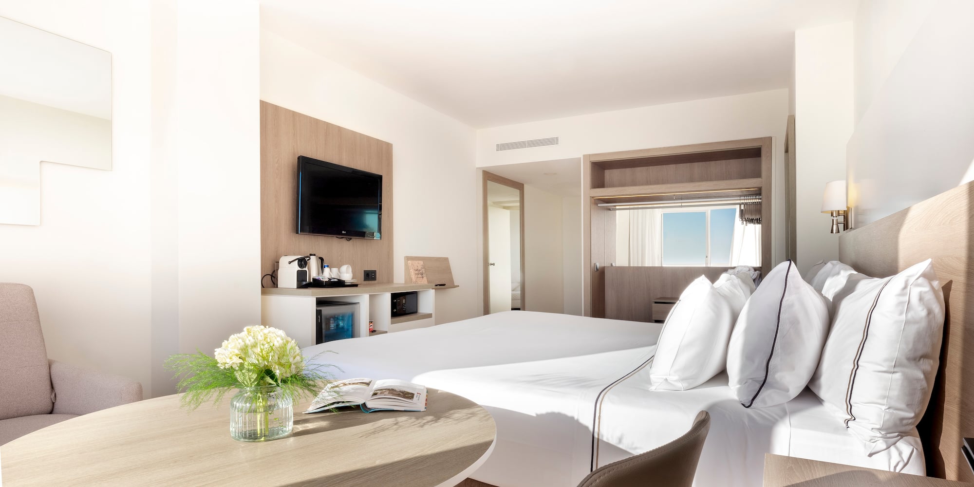 a room with a bed and a table