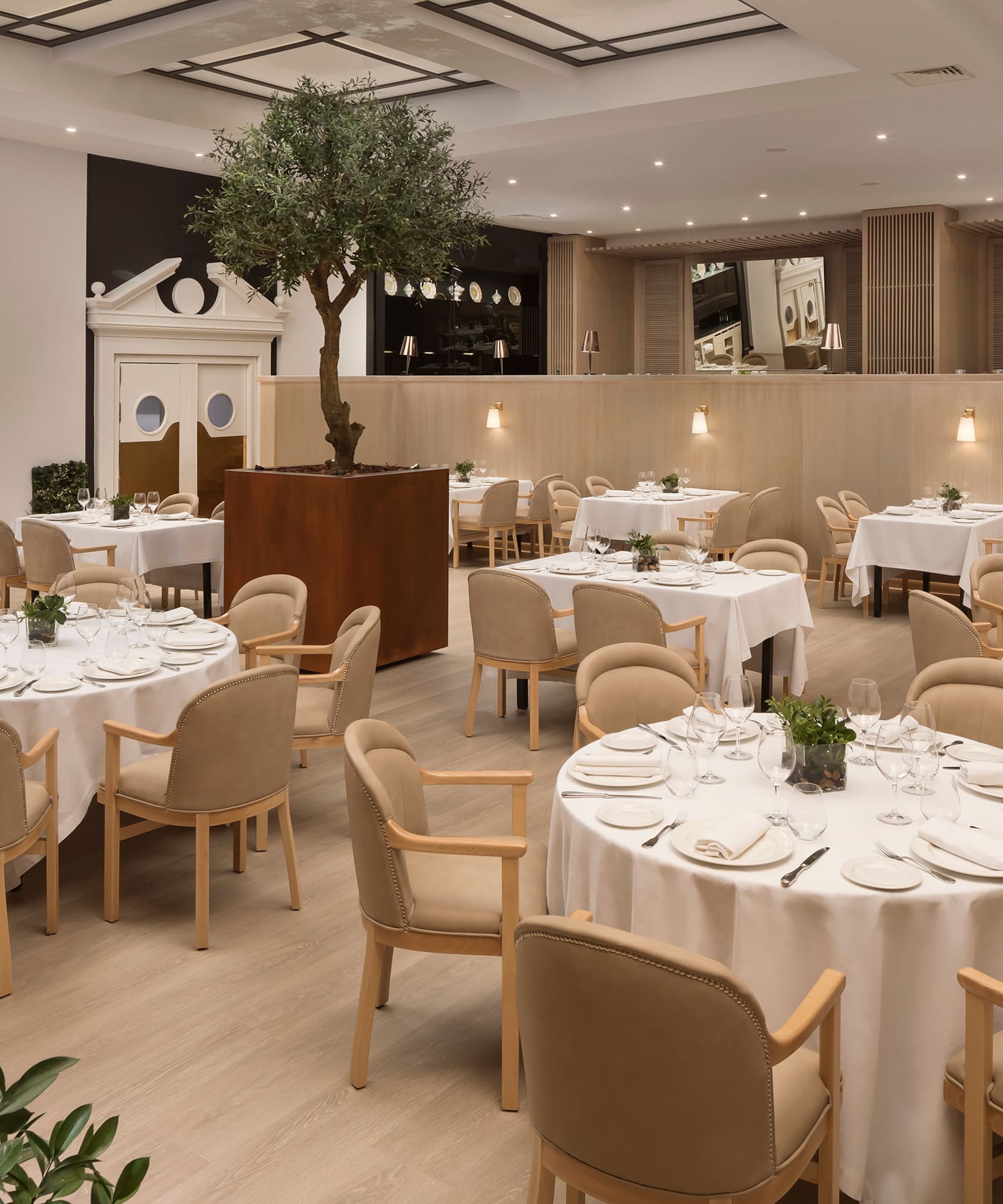 a room with tables and chairs