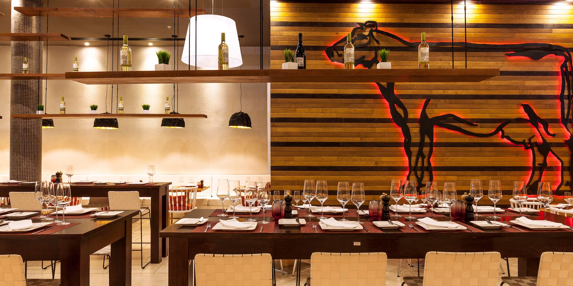 a restaurant with tables and chairs