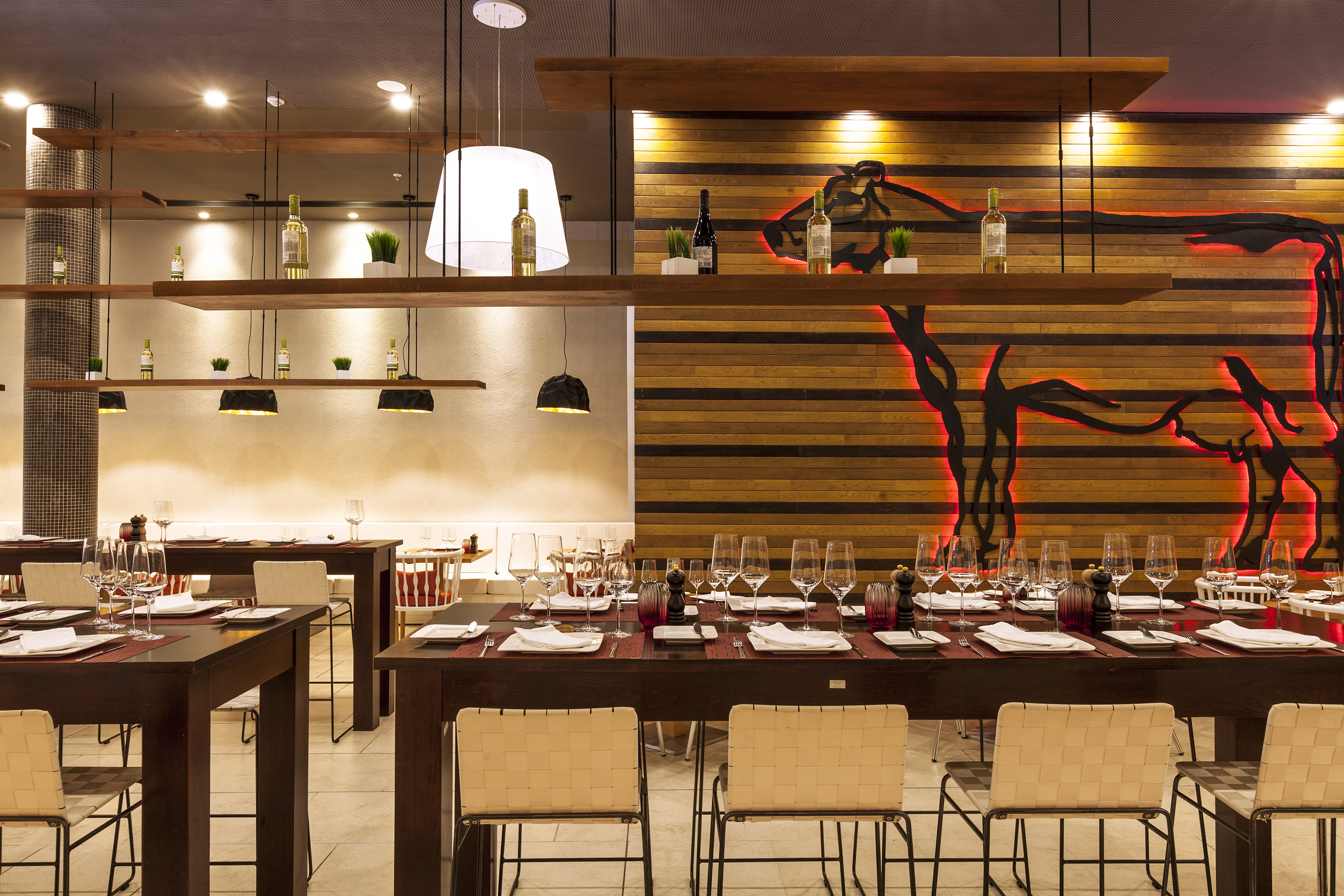 a restaurant with tables and chairs