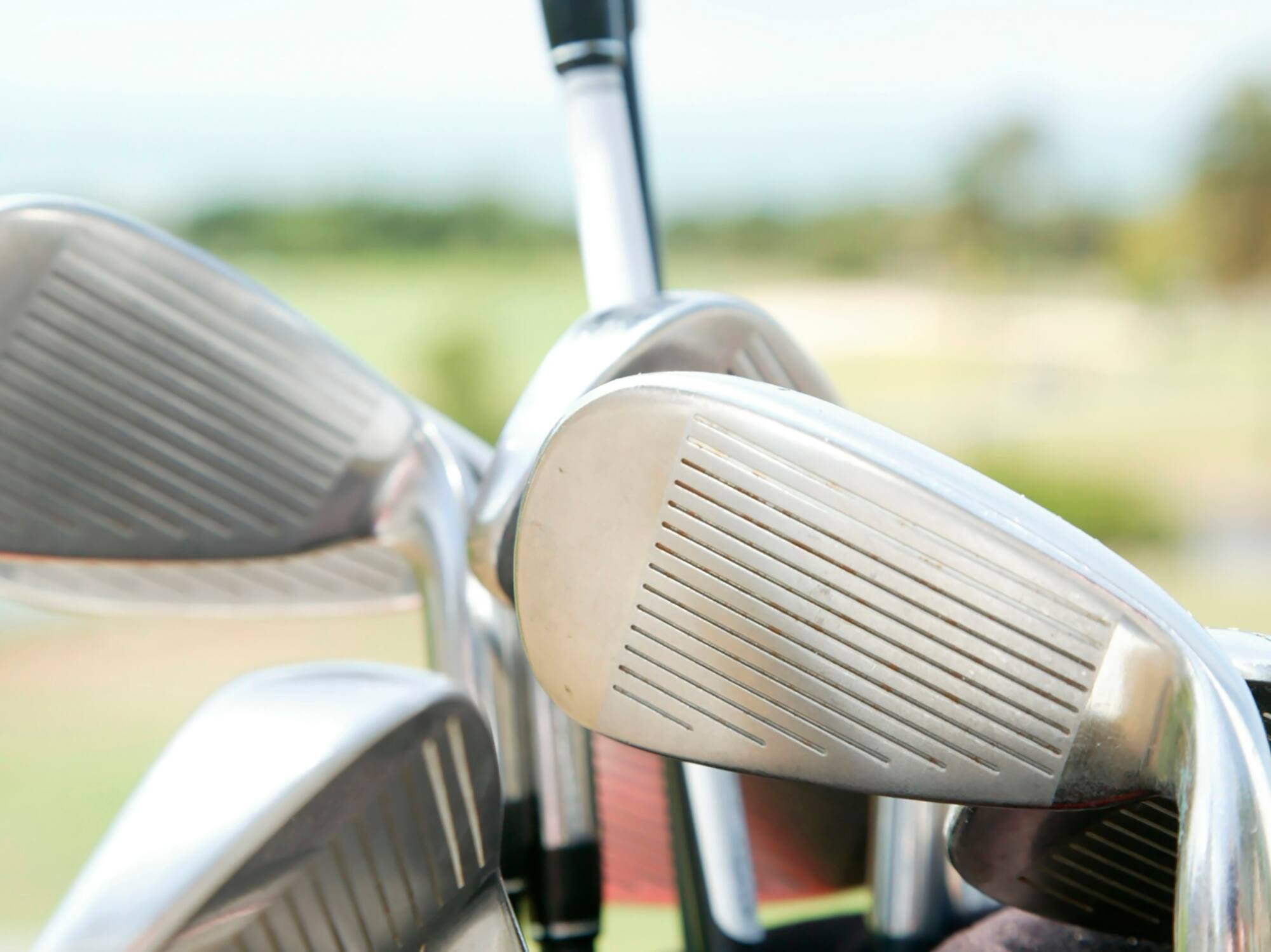 a group of golf clubs