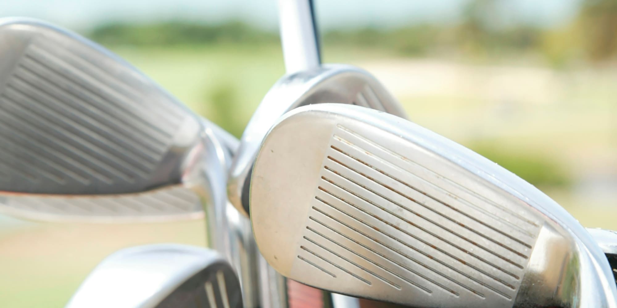 a group of golf clubs