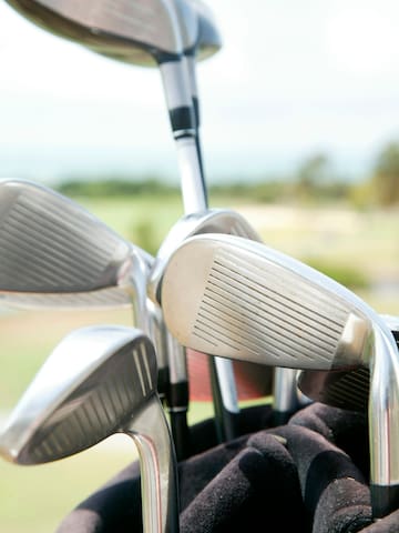 a group of golf clubs
