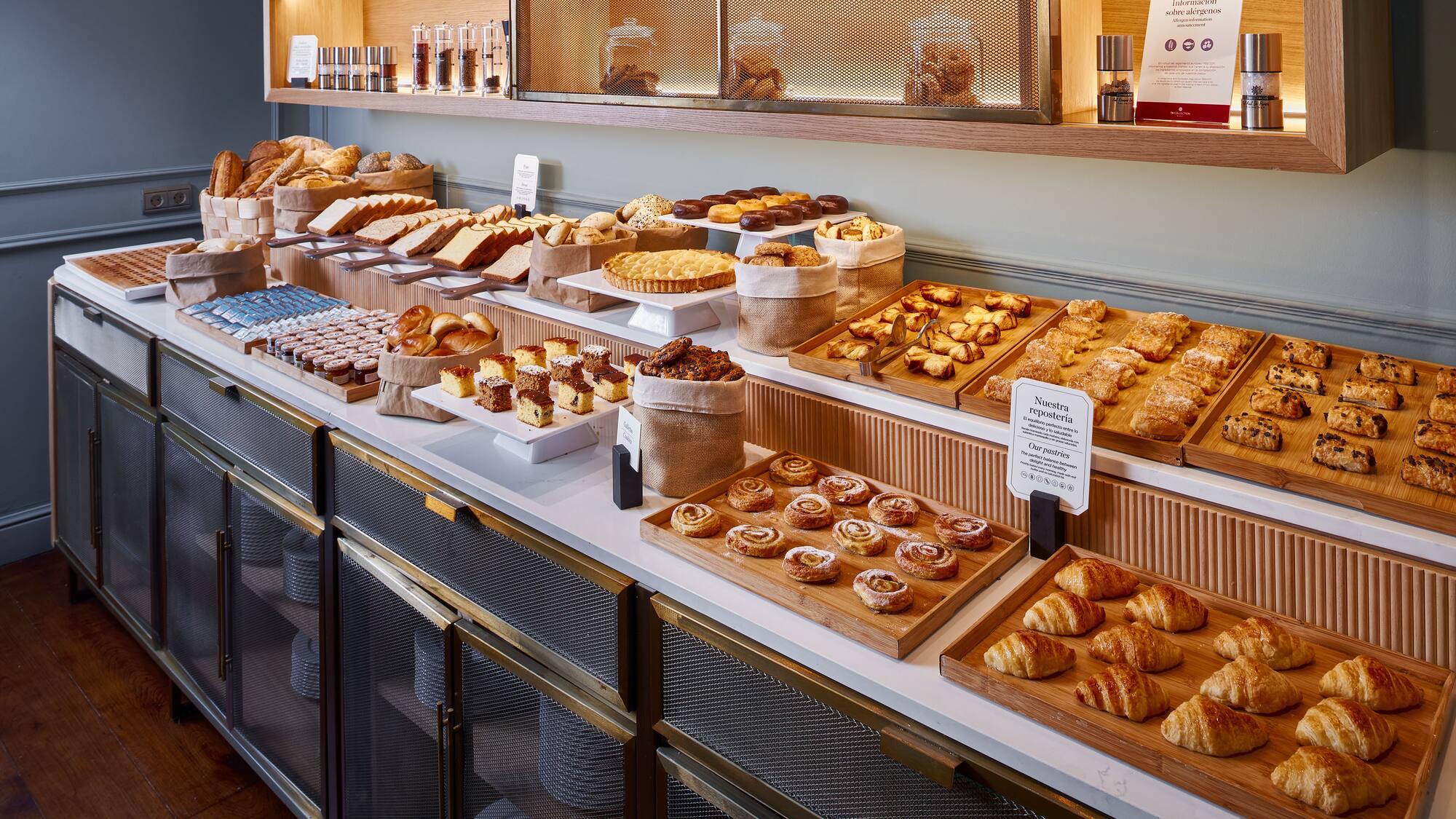 a counter with different types of pastries
