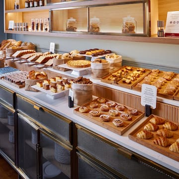 a counter with different types of pastries