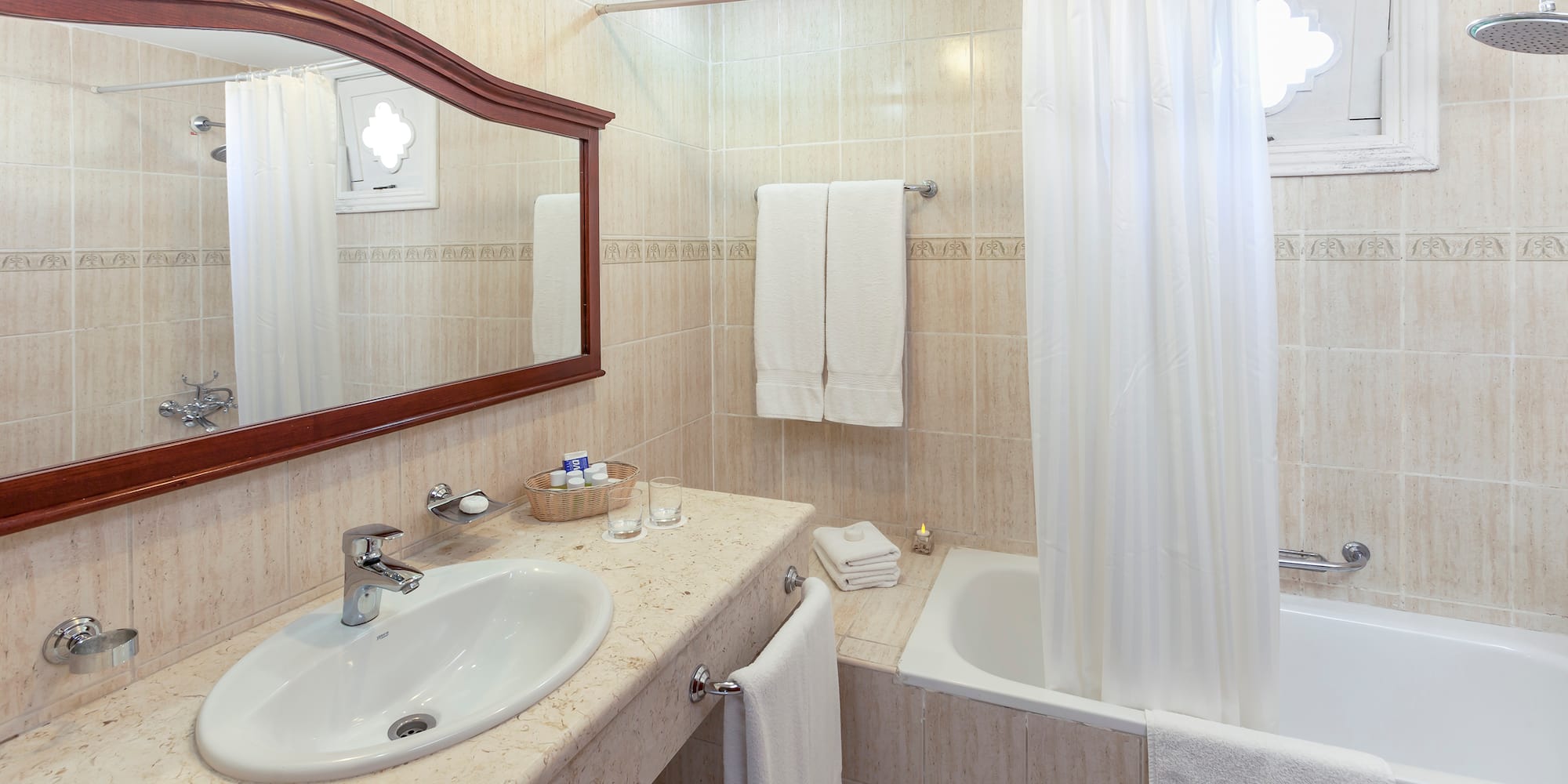 a bathroom with a sink and bathtub