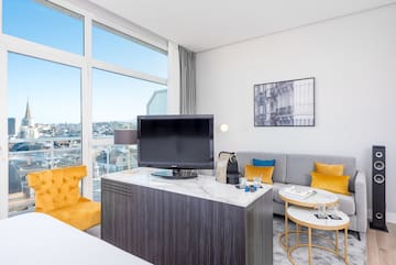 a room with a television and a couch