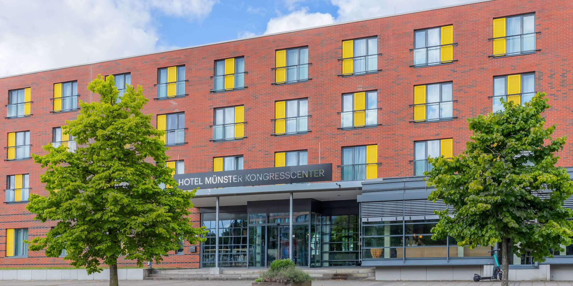 a building with a tree in front of it