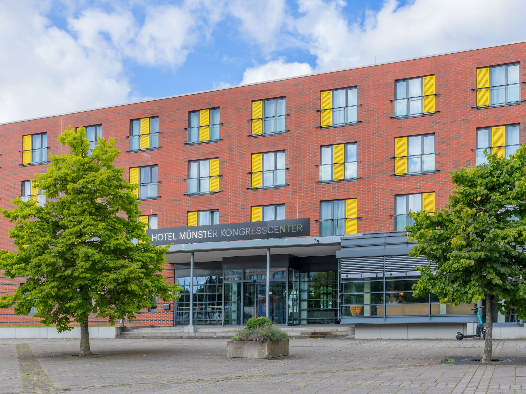 a building with a tree in front of it