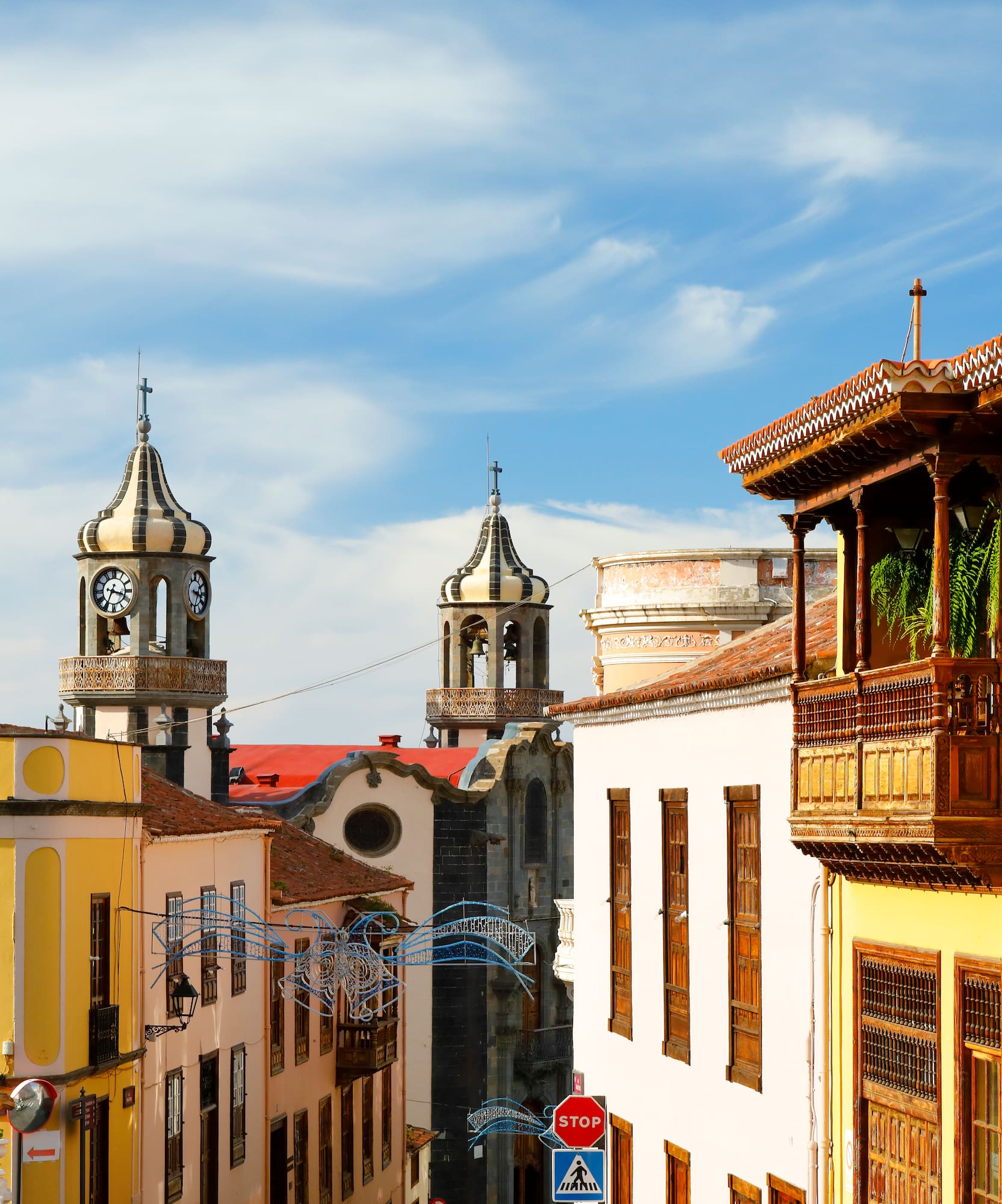 a street with buildings and a clock tower